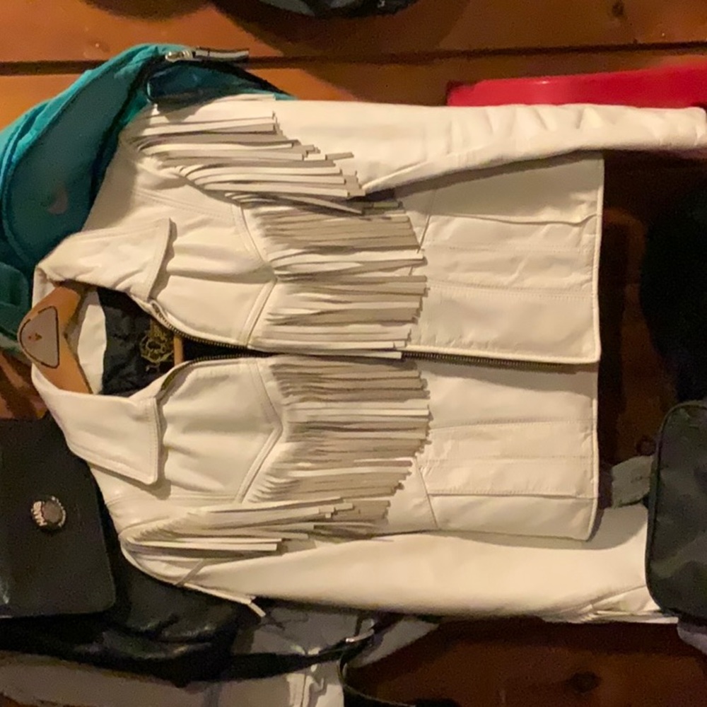 Leather coat . Doesn’t fit me anymore. Fit when I was 115 lbs .